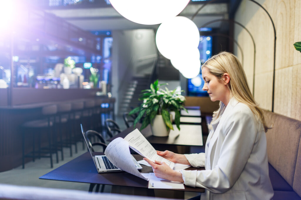 woman reading papers
