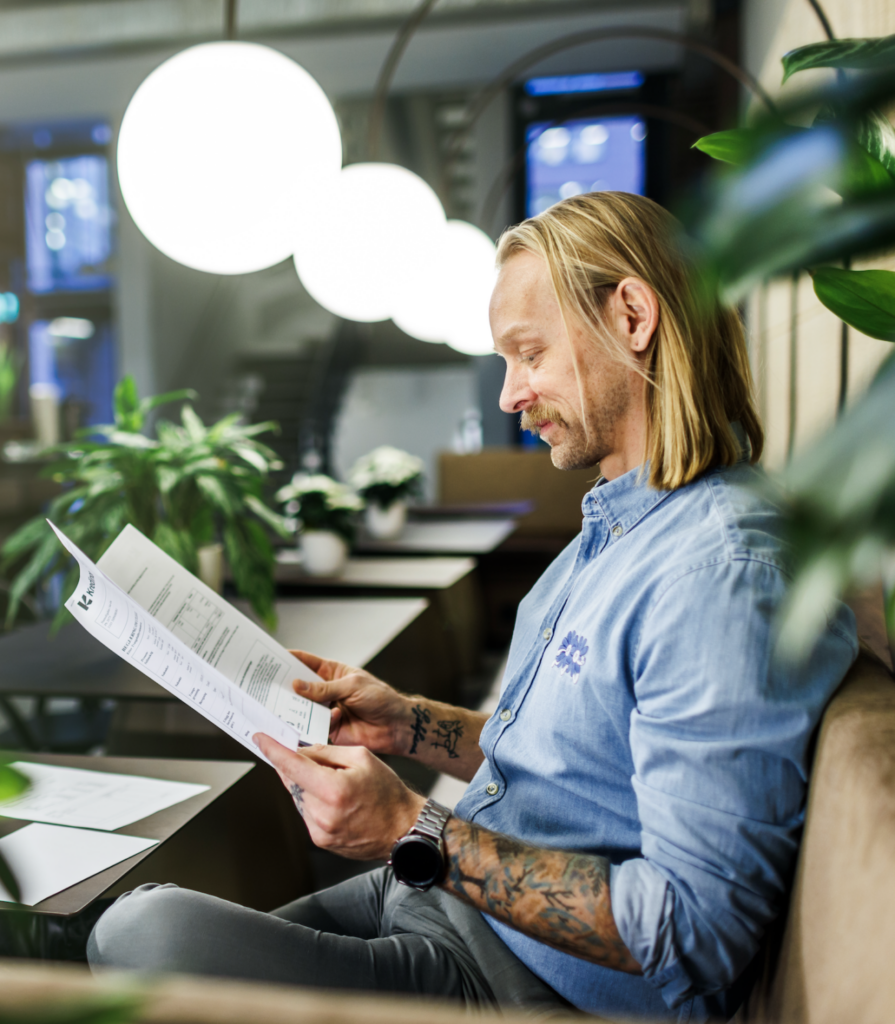man-reading-papers